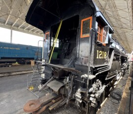 Disconnected from her tender, N&W #1218's cab is on full view. That includes the drawbar and ducting for the automatic stoker. The engine and her tender are on display at the Virginia Museum of Transportation (5/31/26, Phil Bell Photo)