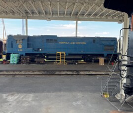 The Virginia Museum of Transportation is home to a Norfolk & Western high-hood ALCO C630. This unit differs from others in its class by both the high short hood and the trucks from traded-in Fairbanks-Morse Trainmasters. (5/31/26, Phil Bell Photo)